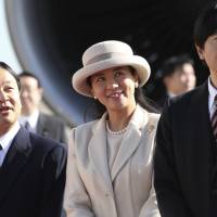 Crown Prince Naruhito (left), Crown Princess Masako (center) and Prince Akishino see off Emperor Akihito and Empress Michiko at Haneda airport in Tokyo on Nov. 30, 2013. Japan's Crown Prince ready for throne, but no fairy tale for his unhappy Crown Princess