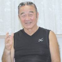 Film director Shoichiro Sasaki is interviewed on July 30 in Yokohama. Filmmaker depicts father's slaying by 'war yakuza' in debut feature film