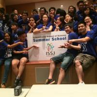 Students from Japan and other Asian countries pose after an award ceremony on the last day of International School of Science Summer School 2016 in Yokosuka Research Park in Yokosuka, Kanagawa Prefecture, on Aug. 9. Asian students finish cross-cultural summer science course in Yokosuka
