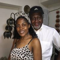 The Zambian connection: I've lived around the world, and when you live in another country or another culture, you have to become a child again, because only then can you learn without judging, says Axson Chalikulima, pictured here with his wife, Samantha, who also hails from Zambia, at their home in Tokyo. After 30 years in Japan, teacher from Zambia is still learning