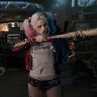 On the mean side: Adewale Akinnuoye-Agbaje as Killer Croc and Margot Robbie as Harley Quinn in “Suicide Squad.” Superhero films need to reach beyond the geeks