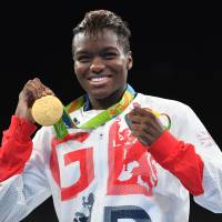 British flyweight champion Nicola Adams is seen with her gold medal at the Rio Olympics on Saturday. Two-time Olympic champion boxer Adams aims to inspire children