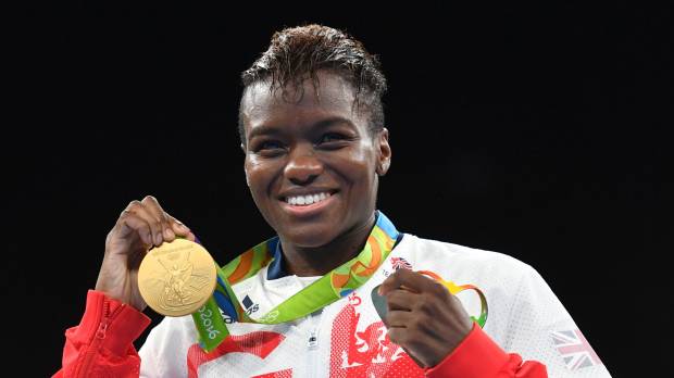 British flyweight champion Nicola Adams is seen with her gold medal at the Rio Olympics on Saturday. Two-time Olympic champion boxer Adams aims to inspire children
