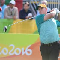 Australia's Marcus Fraser competes in the first round of the golf competition at the 2016 Summer Olympics on Thursday in Rio de Janeiro. Australia's Fraser leads Olympic golf tournament