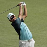 Hideki Matsuyama watches his approach shot to the ninth hole during the second round of the Wyndham Championship in Greensboro, North Carolina, on Friday. Matsuyama cards 6-under 64, trails by two strokes after two rounds