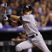 Marlins pinch hitter Ichiro Suzuki singles in the eighth inning off the Rockies' Jordan Lyles for his 2,999th hit in the majors. Ichiro reaches 2,999 hits with infield single
