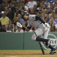New York's Alex Rodriguez runs to first base on an RBI groundout against Boston in the eighth inning on Thursday night. The Yankees won 4-2. A-Rod takes booing in stride in win
