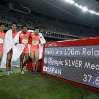 Japan's Ryota Yamagata (left), Shota Iizuka, Yoshihide Kiryu and Aska Cambridge set an Asian record in the men's 4x100-meter relay final, finishing the race in 37.60 seconds to earn the silver medal at the Rio Olympics on Friday night in Rio de Janeiro. Track legend Bolt, other sprint stars praise Japan relay foursome's teamwork, dedication