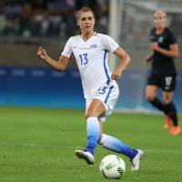 Alex Morgan moves the ball for the United States during Wednesday's Olympic game against New Zealand in Belo Horizonte, Brazil. The U.S. won 2-0. U.S. women open bid for fourth straight gold with win