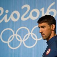 Michael Phelps, who will be the flag bearer for the United States at the opening ceremony, holds a news conference on Wednesday in Rio de Janeiro ahead of the start of the Olympic Games on Friday. Phelps leaves door open to compete in 2020