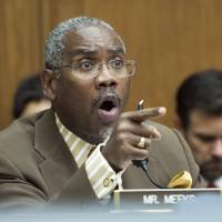 House Financial Services Committee member Rep. Gregory Meeks, D-N.Y., questions Wells Fargo CEO John Stumpf on Capitol Hill in Washington Thursday during the committee's hearing investigating Wells Fargo's opening of unauthorized customer accounts. Wells Fargo boss blasted in Senate over fraud; workers say they got axed for reporting sales quota 'gaming'