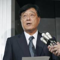 Mitsubishi Motors Corp. Chairman Osamu Masuko speaks to reporters Thursday at the transport ministry after the embattled carmaker received a second reprimand over its fuel economy-testing methods. Mitsubishi Motors gets second reprimand over mileage data fraud
