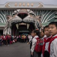 Visitors wait to enter the Museum of Natural History in Pyongyang on Wednesday. U.S. probing more Chinese firms over 'risky' North Korea sanctions violations