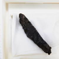 A fragment of a burned scroll is seen in 2015 at the Dead Sea scrolls laboratory in Jerusalem after specialists, thanks to modern scanning technology, managed to decipher Hebrew text on the artifact, revealing that the scroll is believed to be a 1,500-year-old copy of the beginning of the book of Leviticus. Google-funded scanning software 'unwraps' 2,000-year-old charred biblical scroll