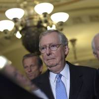 Senate Majority Leader Mitch McConnell, flanked by Sen. John Thune (left) and Senate Majority Whip John Cornyn, arrivse for a news conference on Capitol Hill in Washington Sept. 13. 'Republican-only' stopgap spending bill offers Zika funds, leaves Flint, Ex-Im Bank in lurch