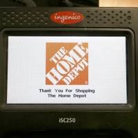 The Home Depot logo appears on a credit card reader in May at a Home Depot store in Bellingham, Massachusetts. The Yahoo hack, reported on Thursday, exposed personal details from at least 500 million user accounts, potentially the largest breach of an email provider in history. Home Depot said in September 2014 that attackers stole 56 million debit and credit card numbers in a months-long breach of its computer systems. About two months later, the nation's largest home improvement chain disclosed that hackers also stole 53 million email addresses in addition to the card data. Yahoo confirms apparently state-sponsored hack hit 500 million users in 2014, urges password changes