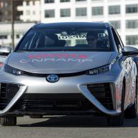A Toyota Motor Corp. Mirai fuel cell sedan is driven in San Francisco on Nov. 13, 2015. California's eco-car campaign short on fuel as automakers use green credits to offset quotas