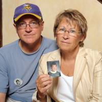 Patty and Jerry Wetterling show a photo of their, son Jacob Wetterling, who was abducted in October 1989 in St. Joseph, Minnesota and was still missing, in Minneapolis in 2007. Patty Wetterling said Saturday that his remains have been found. Persistence pays off in probe into boy's 1989 abduction in Minnesota