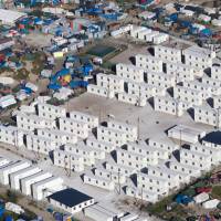 The Jungle migrant camp in Calais, northern France, is seen Aug. 24. Tempers are rising among migrants squeezed in record numbers into the shrinking slum camp in France's port city, where hours-long waiting lines for food and showers and the tightening grip of security forces are leaving emotions raw. France to raze in stages 'Jungle' migrant camp to 'clear Calais'