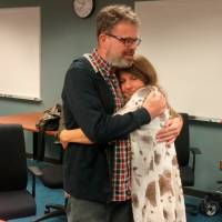 Kevin Garratt, a Canadian held in China for two years on suspicion of spying, hugs his wife, Julia, after arriving back in Vancouver, British Columbia, on Thursday. Canadian imprisoned in China on 'spying' charges back home after two years behind bars