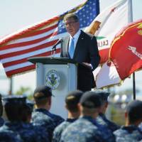 Secretary of Defense Ash Carter speaks to sailors on the flight deck of the USS Carl Vinson Thursday at Naval Air Station, North Island in Coronado, California. Pentagon chief calls U.S.-Philippines military alliance ironclad, vows Asia forces boost
