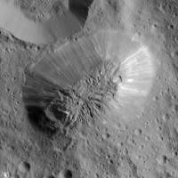This image provided by NASA shows an inactive volcano on the surface of Ceres, the largest object in the asteroid belt between Mars and Jupiter. Scientists said the volcano on the dwarf planet Ceres is about half as tall as Mount Everest. NASA's Dawn orbiter spots inactive volcano on large asteroid Ceres