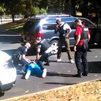 This image from video taken by Rakeyia Scott shows the moments after the Tuesday shooting of Keith Lamont Scott in Charlotte, North Carolina, on. Video shows deadly encounter between Keith Lamont Scott and Charlotte police