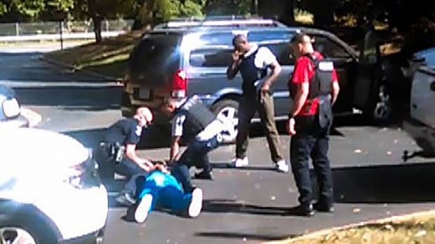 This image from video taken by Rakeyia Scott shows the moments after the Tuesday shooting of Keith Lamont Scott in Charlotte, North Carolina, on. Video shows deadly encounter between Keith Lamont Scott and Charlotte police