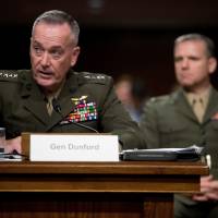 Joint Chiefs Chairman Gen. Joseph Dunford testifies on Capitol Hill in Washington Thursday before the Senate Armed Services Committee hearing. Dunford and Defense Secretary Ash Carter faced sharp questions from Republicans angry that the Obama administration is not taking more aggressive steps to end the five-year-old-civil war in Syria. Islamic State shell that hit Iraqi base housing U.S. troops contained sulfur-mustard agent