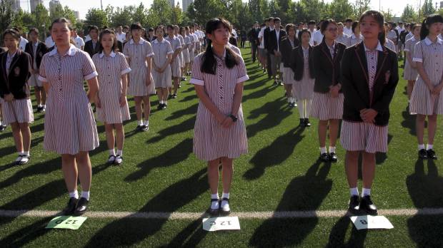 Students attend the opening ceremony of Haileybury College's Chinese campus in Tianjin on Aug. 31. China's demand for pricey international schools 'insatiable'