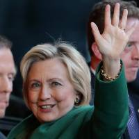 U.S. Democratic presidential candidate Hillary Clinton waves as she arrives for a meeting with Israel's Prime Minister Benjamin Netanyahu at a hotel in New York Sunday. Clinton admits she's not naturally gifted communicator but has ability to engage