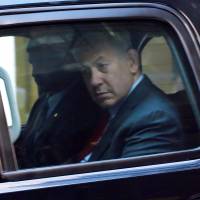 Israeli Prime Minister Benjamin Netanyahu is seen departing following a meeting with Republican presidential nominee Donald Trump on Sunday in New York. Candidates meet Netanyahu to tout foreign policy acumen; Trump aide says fact-checker not Holt's debate role