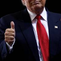 Presidential nominee Donald Trump speaks at a rally on Tuesday at Orlando Melbourne International Airport in Florida. Voters more confident in Trump's health, poll finds