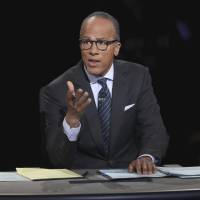 Moderator Lester Holt presides over the first debate between Republican U.S. presidential nominee Donald Trump and Democratic U.S. presidential nominee Hillary Clinton at Hofstra University in Hempstead, New York, on Monday. Moderator Holt fights to control U.S. presidential debate with tough questions, fact checking