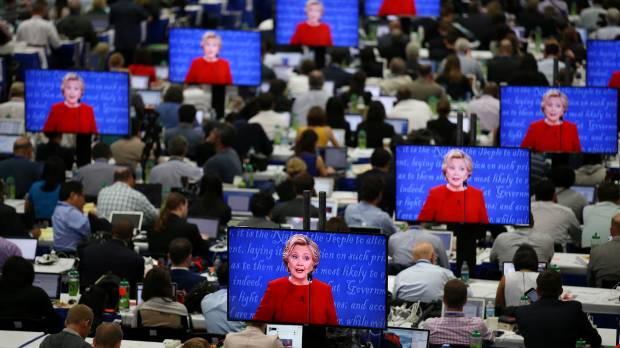 Democratic U.S. presidential candidate Hillary Clinton is seen on television screens at the media room during the first presidential debate with Republican nominee Donald Trump at Hofstra University in Hempstead, New York, on Monday. Takeaways of the first 2016 U.S. presidential debate: Trump's temperament, Clinton's zingers