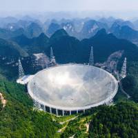 The Five-hundred-meter Aperture Spherical Telescope in southwest China will help search for extraterrestrial life. China begins operating world's largest radio telescope