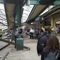Commuter train crashes into New Jersey station; more than 100 injured