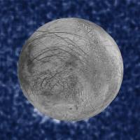 A composite image shows suspected plumes of water vapor erupting at the seven o'clock position off the limb of Jupiter's moon Europa in a NASA Hubble Space Telescope picture taken in 2014 and released Monday. Jupiter moon Europa spewing possible water plumes, Hubble finds
