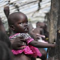Displaced South Sudanese line up for food at a U.N. camp in Juba on July 25. The U.N. says hunger in South Sudan is at unprecedented levels, affecting nearly 5 million people. Hidden data: the new weapon that could beat hunger