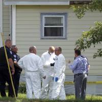 Ashland Police Department and Ohio BCI execute a search warrant on a home on Tuesday in Ashland, Ohio. Authorities say a woman reported being held captive, leading to the arrest of a kidnapping suspect, a murder confession and the discovery of three bodies. Woman's Ohio abduction leads to homeless man's arrest, discovery of three corpses
