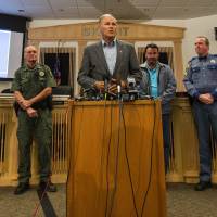 Washington Gov. Jay Inslee is flanked by local law enforcement that worked together to detain Arcan Cetin, 20, suspected in Friday's mass shooting at Cascade Mall in Burlington. Officials gathered in the Skagit County chambers in Mt. Vernon, Washington, on Saturday. 'Creepy' Washington mall shooting suspect had history of run-ins with the law