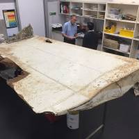 An undated handout photo shows a large piece of debris found in Tanzania recently which has been confirmed as a part of a wing flap from missing Malaysia Airlines passenger jet MH370. Wing flap found in Tanzania confirmed to be part of MH370