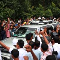 Protesters shout slogans during a rally against former U.N. chief Kofi Annan in Sittwe, Myanmar, on Tuesday as he arrived to examine a bitter religious conflict that has displaced tens of thousands of Muslim Rohingya. Myanmar Buddhists jeer ex-U.N. chief on peace mission