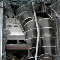A train car is pictured in an aerial photo inside the New Jersey Transit Hoboken Terminal following a train crash in Hoboken, New Jersey, Thursday. Injured driver cooperating in probe of fatal N.J. rush-hour train crash into station