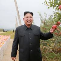 North Korean leader Kim Jong Un tours the Kosan Combined Fruit Farm in this undated photo released Sunday. U.S., South Korea drill to model attack on North's nuclear facility