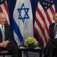 U.S. President Barack Obama gives a wink during a bilateral meeting with Israeli Prime Minister Benjamin Netanyahu in New York on Wednesday. Obama-Netanyahu final meeting friendly but gripes not 'papered over'