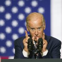 Vice President Joe Biden campaigns at Drexel University, urging students to register to vote and come out for Democratic presidential candidate Hillary Clinton, Tuesday in Philadelphia. Trump's climate stance not Pence's, 'moral center' doubted by Biden