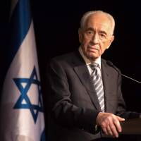 Israeli President Shimon Peres speaks to members of the Foreign Press Association during a visit to the southern Israeli town of Sderot in July 2014. Israeli news website YNet reported early Wednesday that Peres, a Nobel-winning visionary who pushed his country toward peace, had died at 93. Former Israeli President Shimon Peres dies at 93