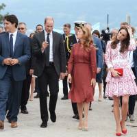 Taking in the Kitsilano Coast Guard station Sunday in Vancouver, British Columbia are (from left) Canadian Prime Minister Justin Trudeau, the Duke of Cambridge, Sophie Gregoire Trudeau and the Duchess of Cambridge. Trudeau honeymoon ends as Prince George, 3, snubs his high-five