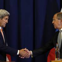U.S. Secretary of State John Kerry and Russian Foreign Minister Sergey Lavrov shake hands at the conclusion of their Sept. 9 news conference in Geneva following a meeting to discuss the crisis in Syria. U.S. tells Russia military cooperation in Syria is not guaranteed